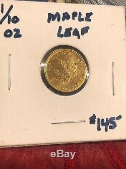 1/10 OZ Gold Canadian Maple Leaf. 999 Fine Gold. Red Dots On Coin