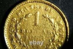 1853 one $1 Liberty Head gold coin. Fair-Good to Fine condition