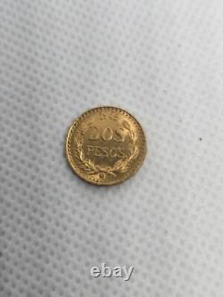 1945 Mexico Dos Pesos 1.66 gram Gold Coin Rare Uncirculated. 900 Fine Gold 1945 Mexico Dos Pesos 1.66 gram Gold Coin Rare Uncirculated. 900 Fine Gold