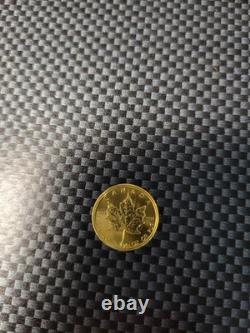 1986 1/10 Oz. 5$ Canadian Maple Leaf. 9999 Fine Gold Coin 1986 1/10 Oz. 5$ Canadian Maple Leaf. 9999 Fine Gold Coin