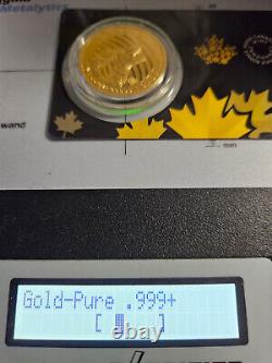 2014 Royal Canadian Mint 1 oz Gold Coin. 99999 Fineness Wild Howling Wolf