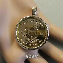 9ct gold New pendant that will fit a one Oz fine gold krugerrand bullion coin