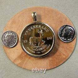 9ct gold New pendant that will fit a one Oz fine gold krugerrand bullion coin