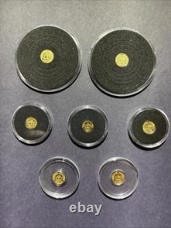 Lot Of (7) Monarch Precious Metals 1/4 Gram. 999 Fine Gold Horseshoe Coin In Cap Lot Of (7) Monarch Precious Metals 1/4 Gram. 999 Fine Gold Horseshoe Coin In Cap
